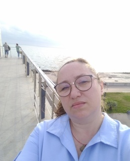 Мила