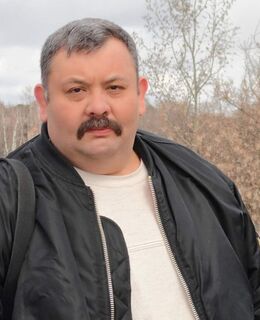 Николай